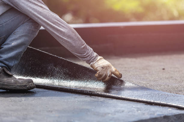 Professional Waterproofing technician working in Andrews, IN
